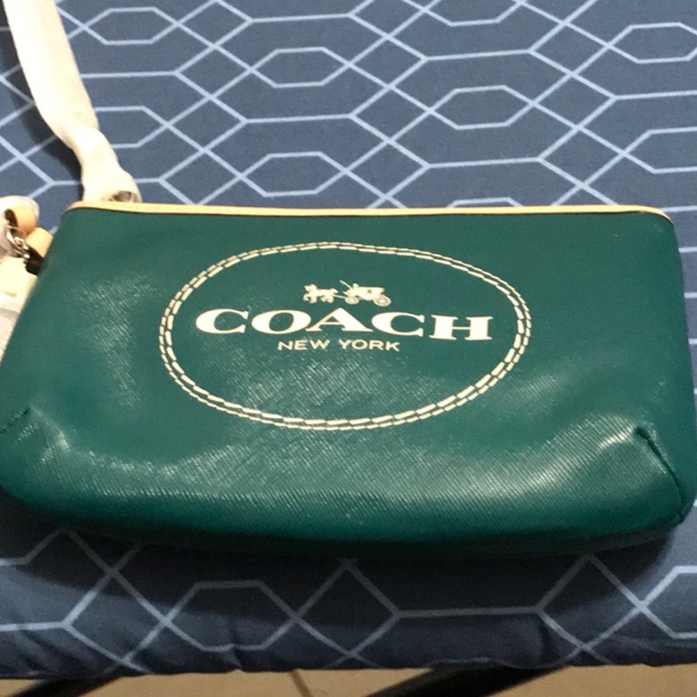 Coach wristlet, leather , dark green color, new